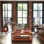 Garden level family room with exposed brick and large windows