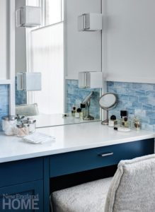 Colorful apartment for empty nesters bathroom lights