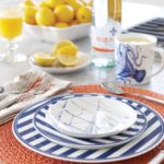 Blue and white place setting with Caskata dinnerware