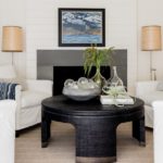 Lisa Tharp Seating Area. Linen Slip Covered Chairs and Black Coffee Table