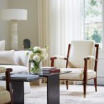 Contemporary Boston town home neutral living room wood and white upholstered chair