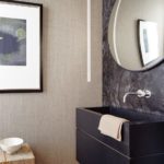 Contemporary Boston town home powder room with black corian sink