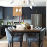Blue kitchen with large dining table