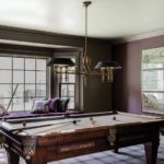 Billiard room with vintage style pool table