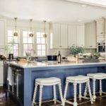 Kitchen with white and blue cabinets