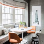 Banquette with orange chairs
