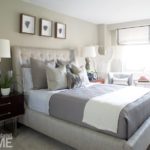 Master bedroom in shades of gray and white with a South African shell sculpture