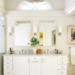 white double vanity in master bathroom
