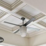 Mid-Cape Home Centers A ceiling shot with white beams and a ceiling fan