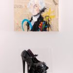 black stiletto heels on a pedestal