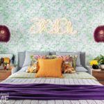 Guest bedroom with neon sign reading chic chick above the bed