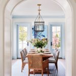 Dining room with white walls and light blue trim