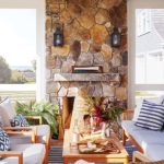 Three season porch with stone fireplace