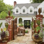Outdoor patio Southport, Connecticut with large wooden gate