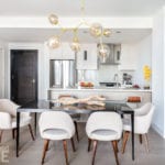 Neutral colored kitchen and dining room Boston high-rise.