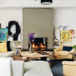Family room with gas fireplace and contemporary art collection