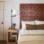 bedroom with woven leather headboard