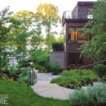 Contemporary coastal Maine home with gardens. Side view.