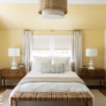 Guest bedroom with yellow walls.
