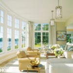 Coastal living room with a wall of windows
