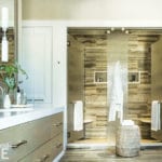 White and beige transitional style bathroom with large glass shower.