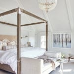 Main bedroom with large four poster bed.
