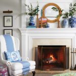 Traditional fireplace with blue and white wingback chair