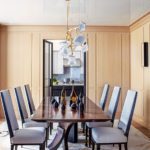 Dining room with anigre-paneled walls
