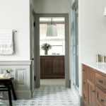 Bathroom with marble mosaic floor tile.