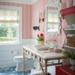 Bathroom with red and white striped wallpaper