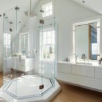 All white bathroom with a freestanding shower
