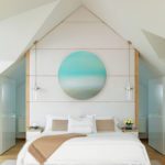 Contemporary coastal bedroom with artwork by Miya Ando