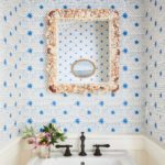 Powder room with blue and white wallpaper