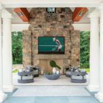 Pool Pavilion with large stone fireplace and TV
