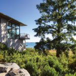 Guesthouse cantilevered over rocks