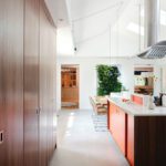 Midcentury kitchen with cathedral ceilings.