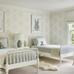 Simple children's room with white jenny lind beds