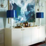 Console with white lamps with glossy blue shades