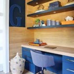 Children's homework zone with built-in desk and cabinetry