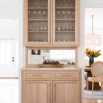 Custom white oak bar cabinetry by Blueprint Advisors
