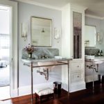 Bathroom with two marble topped washstands