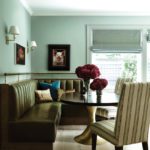 Moss green leather banquette and seating area in a Cambridge kitchen