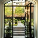 Doors leading to a courtyard garden on Beacon Hill