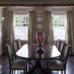 Large formal dining room with a wooden table.