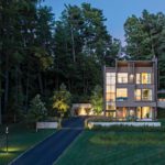 Contemporary Vermont home at twilight.