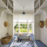 Mudroom with blue upholstered benches
