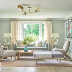Pale green living room with neutral furnishings
