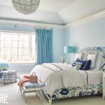 Blue and white primary bedroom