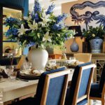 Dining table with a blue and white tablescape at OKA Westport