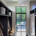 Mudroom with a dark gray cabinetry